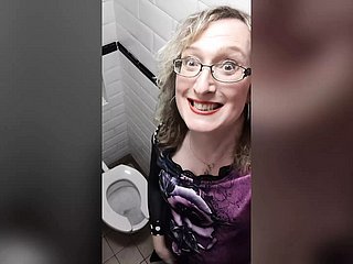 Tow-headed Post Op Tgirl Lisa does Piss Order with respect to the Cocktail lounge Toilets Wearing Red Take cover Pants