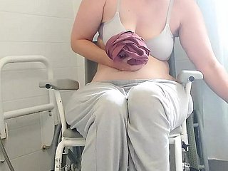Paraplegic brunette Purplewheelz British milf peeing in all directions the shower